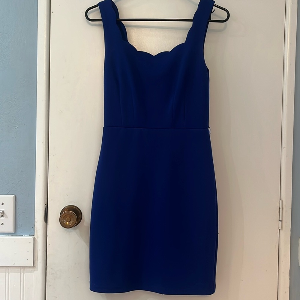 Cute blue dress. Size 5/6. Deserves to be worn more.